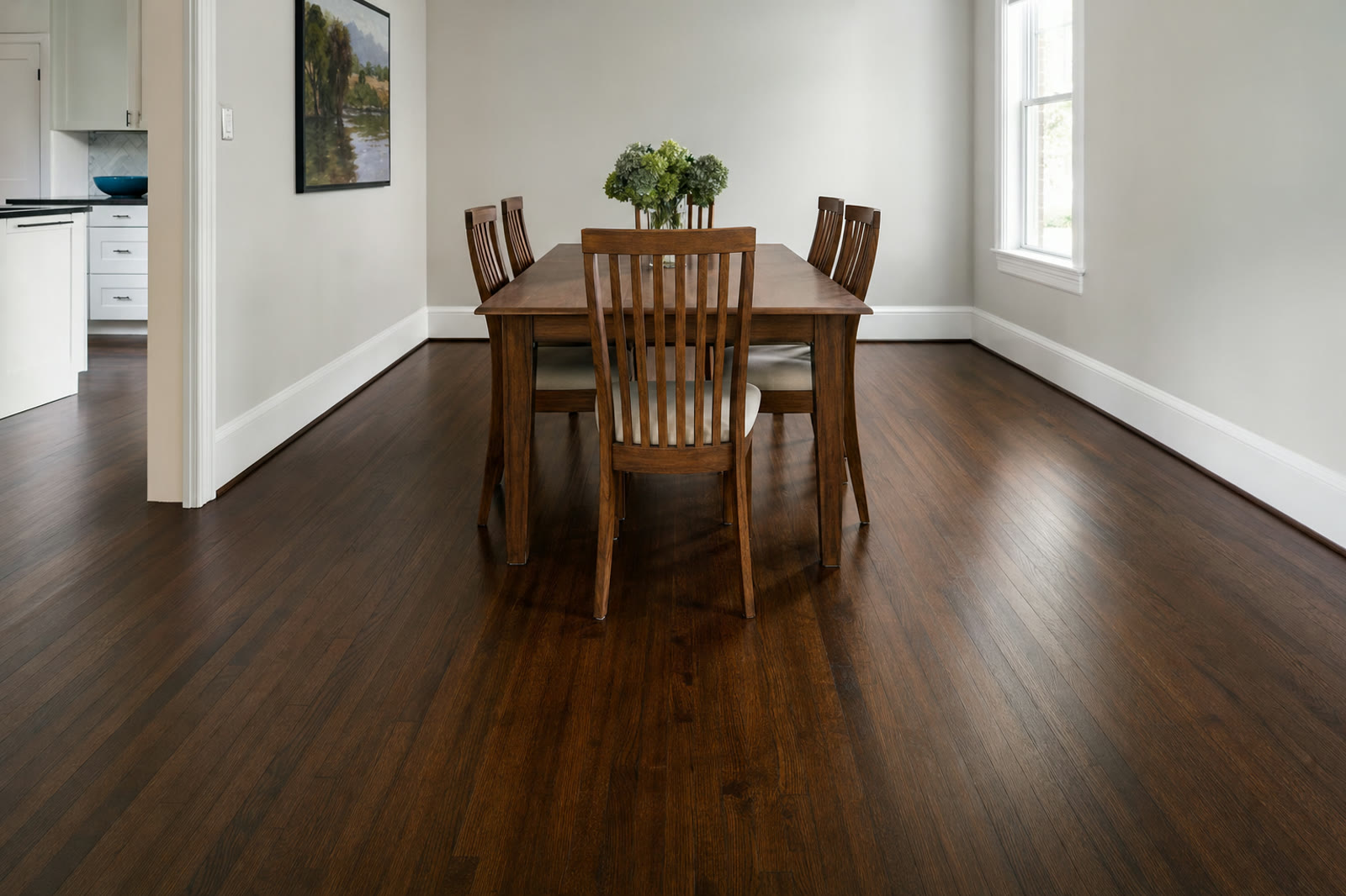 A dining room oak floor stained an even dark walnut brown